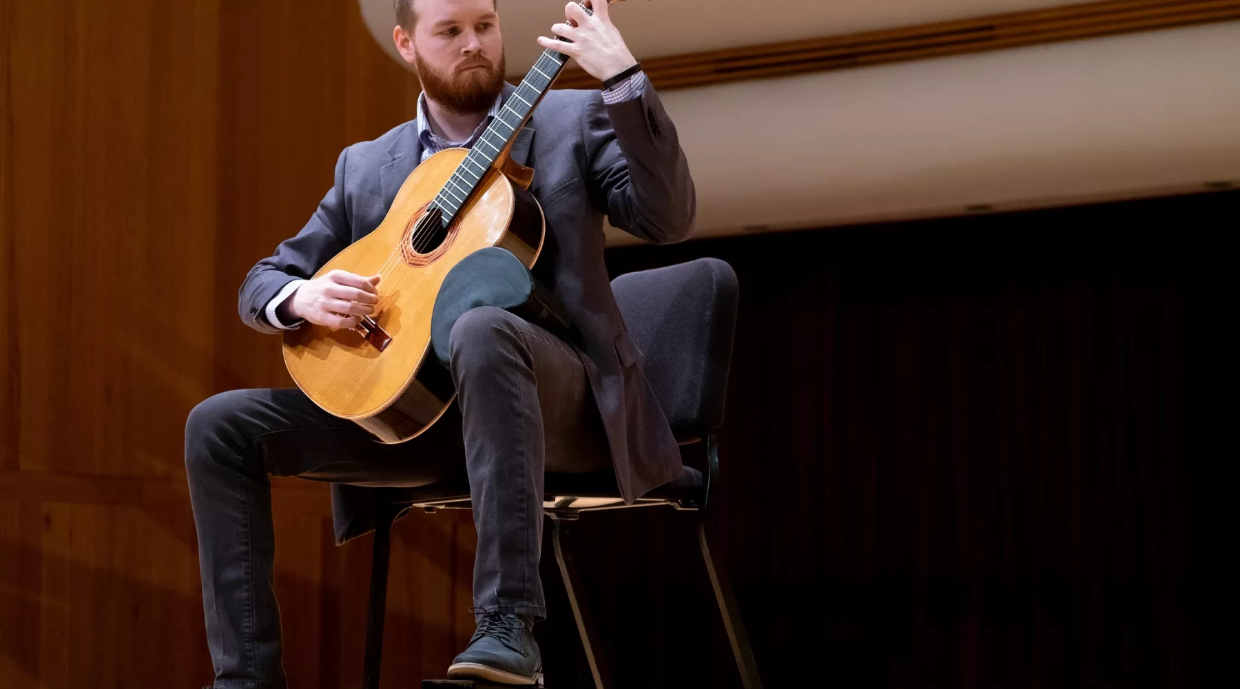 Man plays guitar