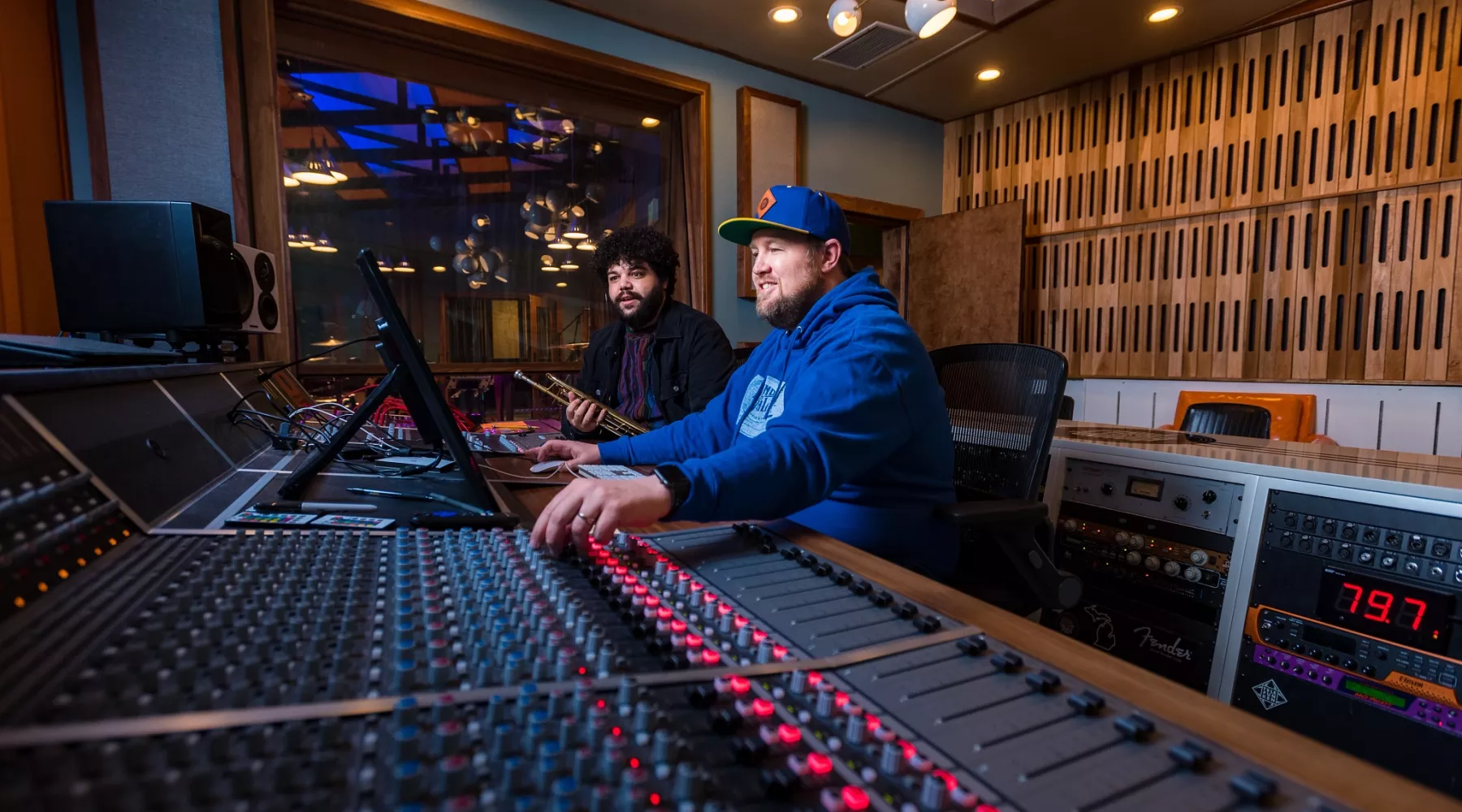 Connor May '16 and Travis Moore work together in their Indianapolis recording studio, Round Table Recording Co.