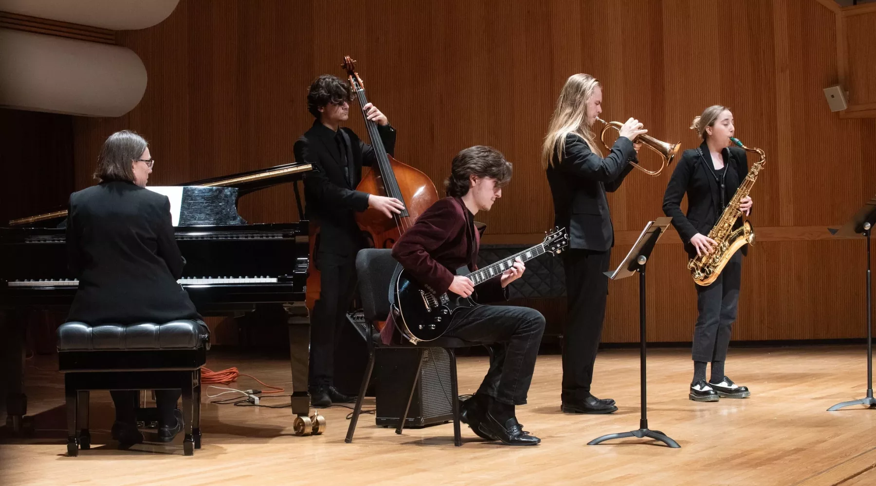 Five students in a jazz band