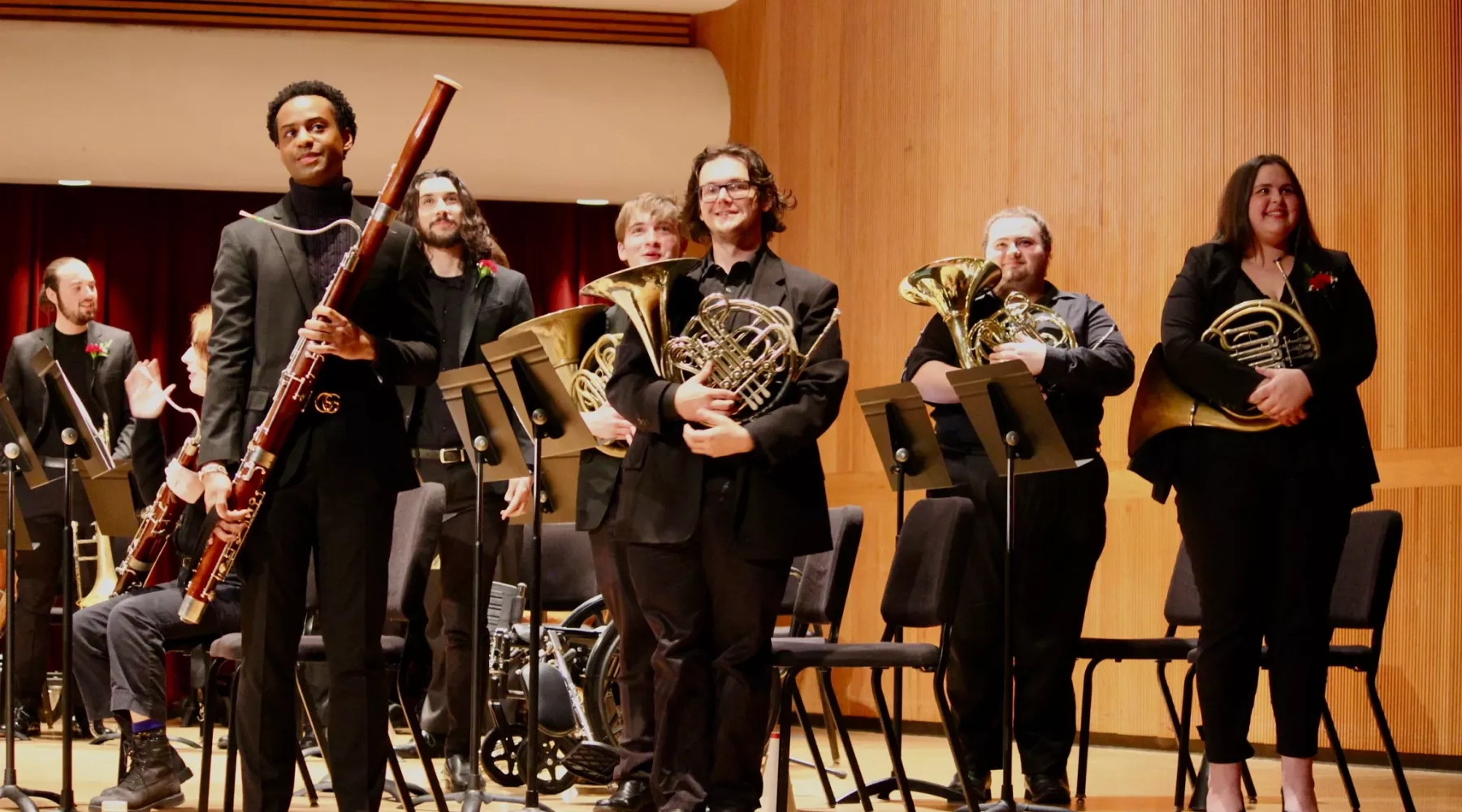 Students standing after wind band concert